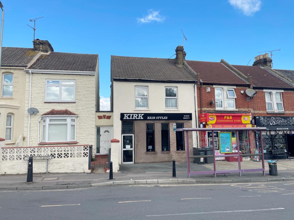 Lot: 111 - FREEHOLD SHOP AND TWO-BEDROOM FLAT - End-terrace mixed use building